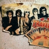 The Traveling Wilburys Album Covers