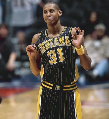 Former Indiana Pacer Reggie Miller (L), and other Pacer greats and